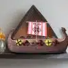 The Viking Ship Urn on a shelf Biodegradable Urn