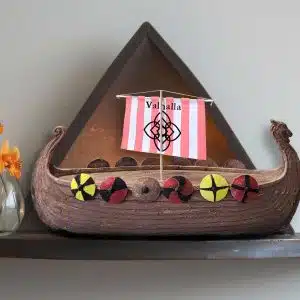 The Viking Ship Urn on a shelf Biodegradable Urn